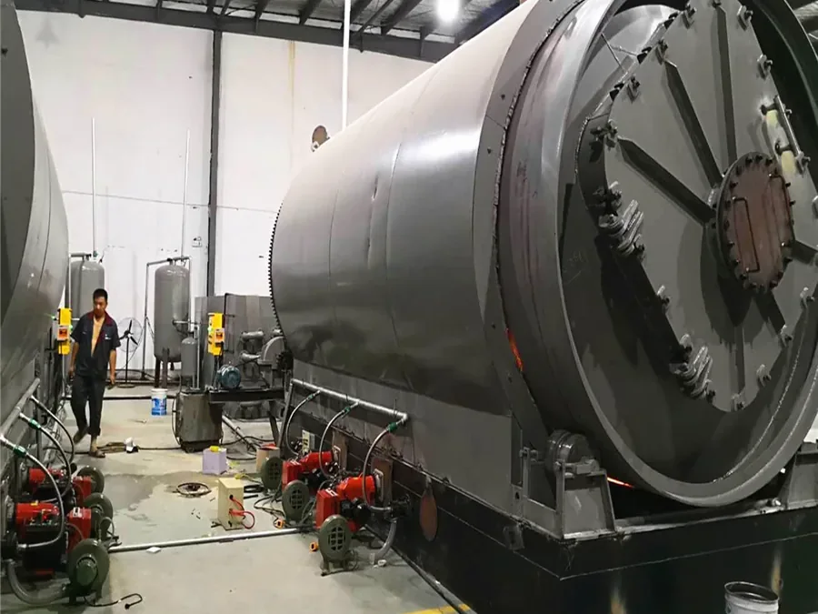 Rotary waste tire pyrolysis reactor with external heating system